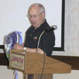 Bill Loudenslager demonstrates child education programs