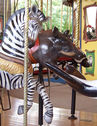 Carousel Works Zebra, Warthog, and Ladybug