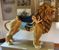 PTC Lion with Cherubs on Display